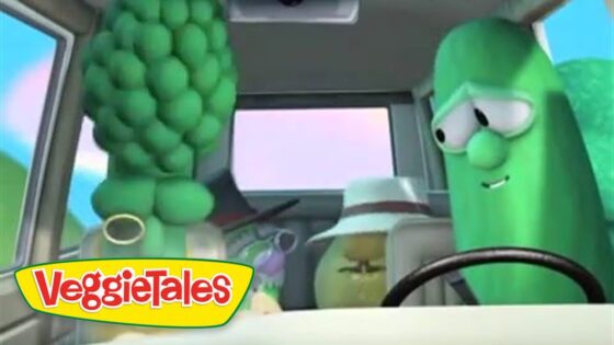 VeggieTales scene with two anthropomorphic vegetables inside a car: a green cucumber at the wheel and a cluster of grapes on the left; VeggieTales logo bottom left.