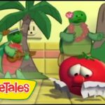 VeggieTales scene: a sad red tomato on tiled floor tearing paper as green veggies play guitars in the background; VeggieTales logo.