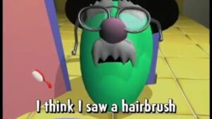 Green cartoon monster with glasses and a mustache says, 'I think I saw a hairbrush' in a yellow-tiled hallway.