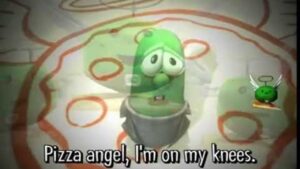 Green cartoon pepper with a halo, kneeling on a pizza-pattern background; caption reads 'Pizza angel, I'm on my knees.'