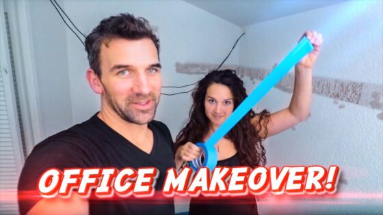 Two people in a partly renovated room; man smiles at camera while woman lifts bright blue tape, with 'OFFICE MAKEOVER!' overlay