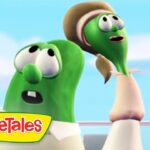 Two VeggieTales cucumbers look surprised against a blue sky, with the VeggieTales logo in the corner.