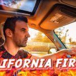 Man driving a car with dramatic flames overlay and bold 'CALIFORNIA FIRES!' text, suggesting a video about wildfires in California.