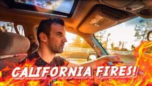 Man driving a car with dramatic flames overlay and bold 'CALIFORNIA FIRES!' text, suggesting a video about wildfires in California.