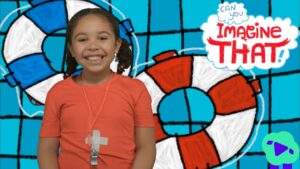 Smiling girl in an orange shirt with a whistle around her neck, standing in front of a blue cartoon lifebuoy background with 'Imagine That' text.