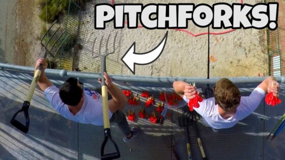 Two people on a high platform hold large pitchforks, with a bold 'PITCHFORKS!' caption across the top of the image.