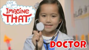 Girl in a lab coat with a stethoscope, smiling at the camera; bold 'Imagine That!' graphic and red 'DOCTOR' text in the foreground.