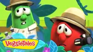 Two VeggieTales characters, a green veggie and a red veggie, wear safari hats in a bright jungle scene with the VeggieTales logo in the foreground.