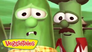 Two worried green peas from VeggieTales stand close, facial expressions downcast with the VeggieTales logo in the corner.