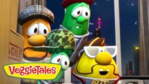 Four VeggieTales characters look surprised while peeking from a doorway at night; VeggieTales logo in the bottom left corner.