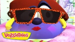 Purple VeggieTales character wearing oversized orange leopard-print sunglasses with red lips; VeggieTales logo in the corner.