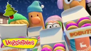VeggieTales characters wearing winter hats peek over boxes of colorful donuts.