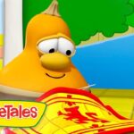 Cartoon yellow veggie character from VeggieTales smiles at a red-and-yellow banner or cape on a bright tiled floor, with the VeggieTales logo in the corner.