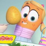 Animated VeggieTales character with blonde hair and big eyes holds a large yellow egg beside a pedestal; VeggieTales logo visible.
