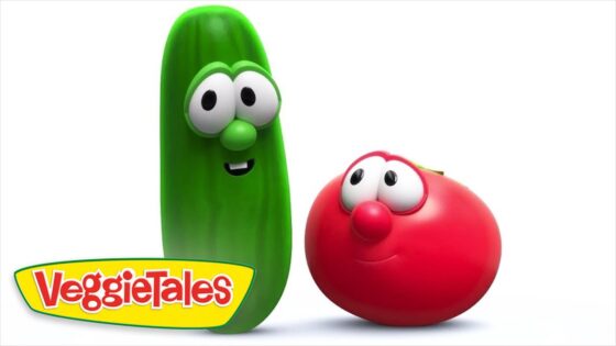 Smiling green cucumber and red tomato cartoon characters from VeggieTales beside the VeggieTales logo on a white background.