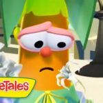 Sad orange carrot character with pink glasses and a frown from VeggieTales.