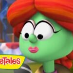 Close-up of a green, red-haired VeggieTales character with pink lips in an animated scene, VeggieTales logo bottom-left.