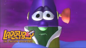 Close-up of a purple cartoon alien with large eyes on a purple space background, with the 'Larryboy: The Cartoon Adventures' logo in the corner.