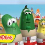 Cartoon VeggieTales characters stand together in a bright backdrop with a large VeggieTales logo in the foreground.