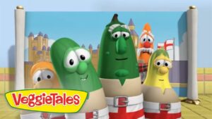 Cartoon VeggieTales characters stand together in a bright backdrop with a large VeggieTales logo in the foreground.