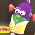 Purple VeggieTales character with a green face and yellow outfit, arms raised in a doorway, logo visible in corner.