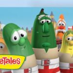 Scene from VeggieTales showing animated vegetables with worried expressions, wearing white belts, in a colorful stage setting with a VeggieTales logo in the corner.