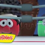 Bob the Tomato and a green VeggieTales character with glasses look surprised in a scene with a blue background and a logo visible.
