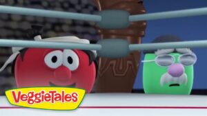 Bob the Tomato and a green VeggieTales character with glasses look surprised in a scene with a blue background and a logo visible.