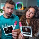 Couple sits in a bright home, showing ultrasound photos and pink markers to the camera with puzzled expressions.