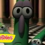 Larry the cucumber with wide eyes and raised arms in a checkerboard hallway; VeggieTales logo in the corner.