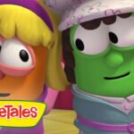 Two VeggieTales characters close-up, orange with yellow hair and a green character wearing a hat, smiling; VeggieTales logo bottom left.