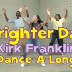 Three kids dance in a studio with a sunny cartoon sun and bold purple-yellow title reading 'Brighter Day Kirk Franklin Dance-A-Long'.