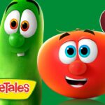 Two VeggieTales characters—a tall green cucumber and a red tomato—smile at the camera with a yellow VeggieTales logo and a 10 min badge on a green background.