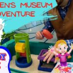 Bright thumbnail for a children's museum adventure: sand play station, a man in a brown vest, cartoon characters, and the text 'Cowboy Jack'.