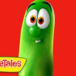 Larry the Cucumber from VeggieTales against a red background with the VeggieTales logo in the corner.