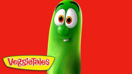 Larry the Cucumber from VeggieTales against a red background with the VeggieTales logo in the corner.