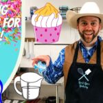 Smiling cowboy baker in a kitchen holds a sneaker-shaped cookie in one hand and a decorated cookie in the other, with a colorful banner reading 'Baking Cookies for Kids!'