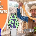 Thumbnail of a cowboy host holding a long strand of slime, with colorful science graphics and 'Cool Science Experiments' branding in the background.