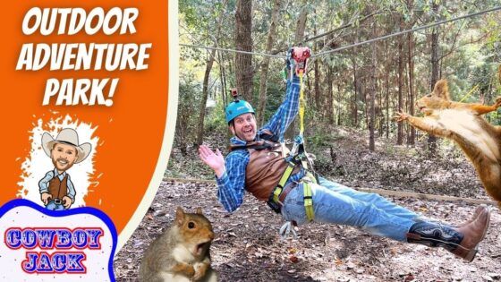 Man in helmet and harness ziplining through a forest, with an orange 'Outdoor Adventure Park' banner and playful squirrels nearby.