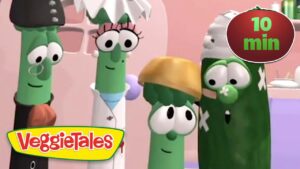 Four VeggieTales characters (green beans) stand together in a pink kitchen set, with a VeggieTales logo in the corner and a red '10 min' badge in the top right.
