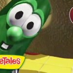 Green VeggieTales cucumber character with a big smile, VeggieTales logo bottom left, and a '1 Hour' badge top right.