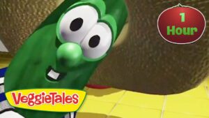 Green VeggieTales cucumber character with a big smile, VeggieTales logo bottom left, and a '1 Hour' badge top right.