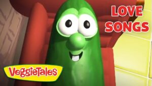 Green VeggieTales cucumber character smiling with 'LOVE SONGS' in red letters on the thumbnail.