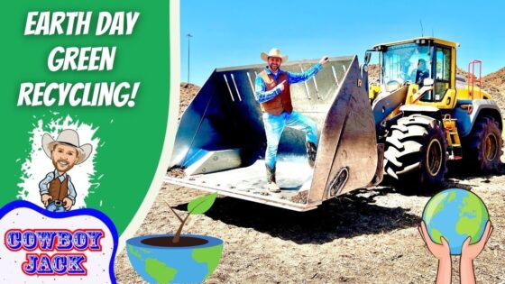 Thumbnail showing a cowboy mascot and bold 'Earth Day Green Recycling' text beside a large yellow front-end loader on a dirt site, with earth-friendly icons nearby.