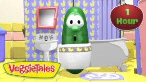 Green veggie character in a bathroom with yellow duck wallpaper and a toilet, from VeggieTales (video thumbnail).