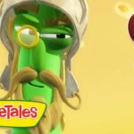 VeggieTales green veggie character with monocle and mustache on a yellow background, logo visible