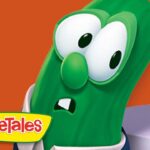 Larry the cucumber from VeggieTales with an orange backdrop and VeggieTales logo in the corner