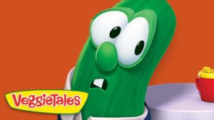 Larry the cucumber from VeggieTales with an orange backdrop and VeggieTales logo in the corner