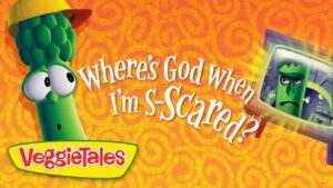 VeggieTales cover art showing a green broccoli character with a yellow hat on the left and a popping “Where's God When I’m Scared?” title across an orange patterned background, with a worried green character inside a monitor on the right.