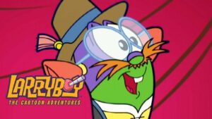 Green cartoon frog, wearing oversized goggles and a brown hat with a blue band, smiling on a pink background with the logo 'LARRYB? The Cartoon Adventures' in the corner.